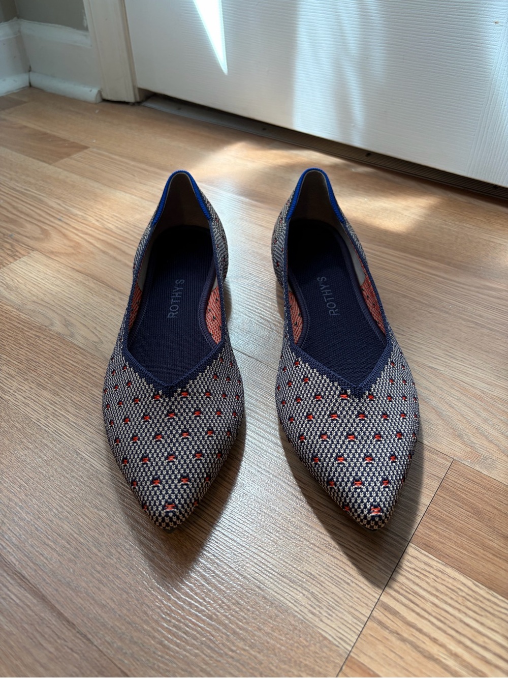Rothy's Navy Pointed Knit Flats with Red Dot Accents